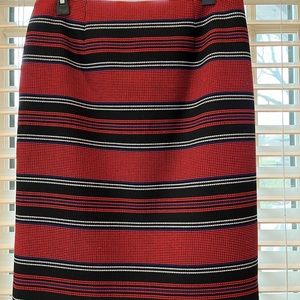 Classy ladies Worth skirt. Red with black, royal blue and white stripe. Size 8